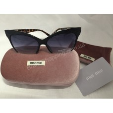 Солнцезащитные очки MIU MIU с леопардовыми дужками 8538O