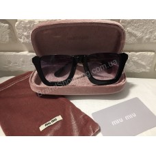 Солнцезащитные очки MIU MIU Lux чёрные SMU21NS