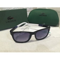 Солнцезащитные очки Lacoste Lux черные c сине-белыми полосатыми дужками 2507