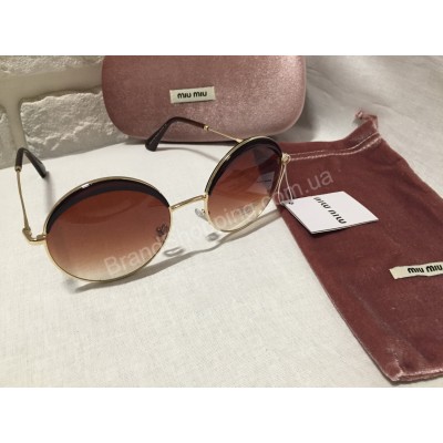 Солнцезащитные очки круглые MIU MIU коричневые OMU51NS