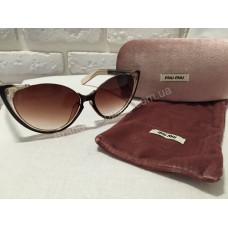 Солнцезащитные очки MIU MIU коричневые 0808S